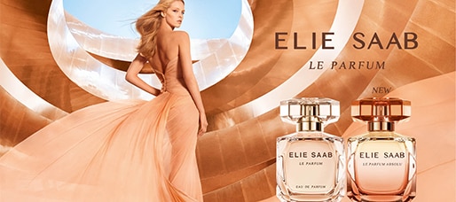 MIT2025-WK50-ElieSaab-CP-Grid-Banner.jpg Elie Saab Le Parfum con due flaconi eleganti su sfondo dorato e abito lungo color pesca, nuova fragranza.