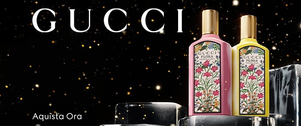 Gucci fragranze Flora Gorgeous Gardenia e Gorgeous Magnolia in flaconi rosa e giallo su sfondo nero con dettagli dorati, acquista ora.