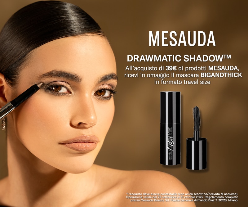 Prodotti Mesauda con ombretto Drawmatic Shadow e mascara BigandThick in formato travel size, offerta omaggio con acquisto di 39€, testo promozionale su sfondo dorato.