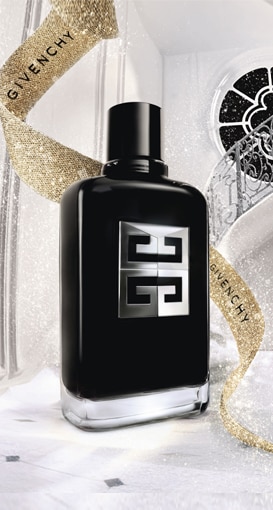 Givenchy profumo iconico in flacone nero con nastro dorato su sfondo sofisticato.