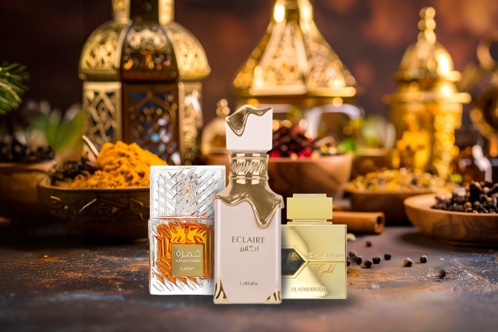 Profumi Lattafa e Al Haramain in flaconi dorati e argentati, ambientazione orientale con spezie e lanterne decorative.