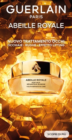 Guerlain Abeille Royale Youth Repair Eye Care presentato su sfondo dorato a nido d’ape, con focus sul nuovo trattamento occhi per occhiaie, rughe ed effetto lifting.