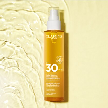 150 ML Clarins HUILE SOLAIRE Olio Solare Illuminante Protezione Alta SPF 30  1 di 5 